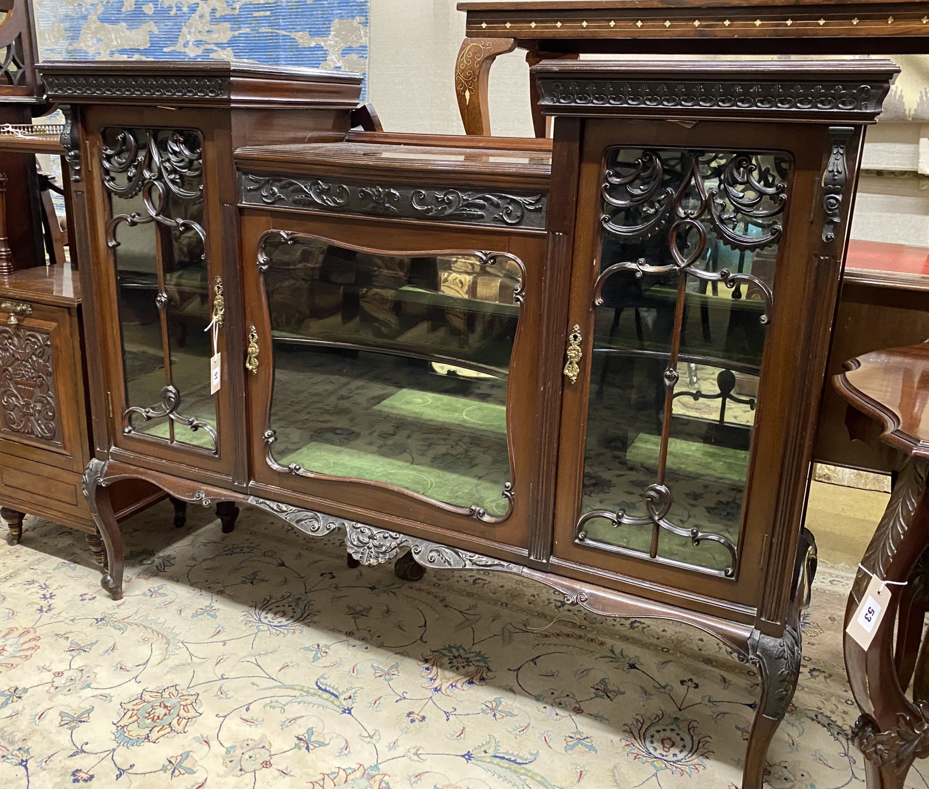 A late Victorian glazed mahogany side cabinet, width 136cm, depth 40cm, height 109cm